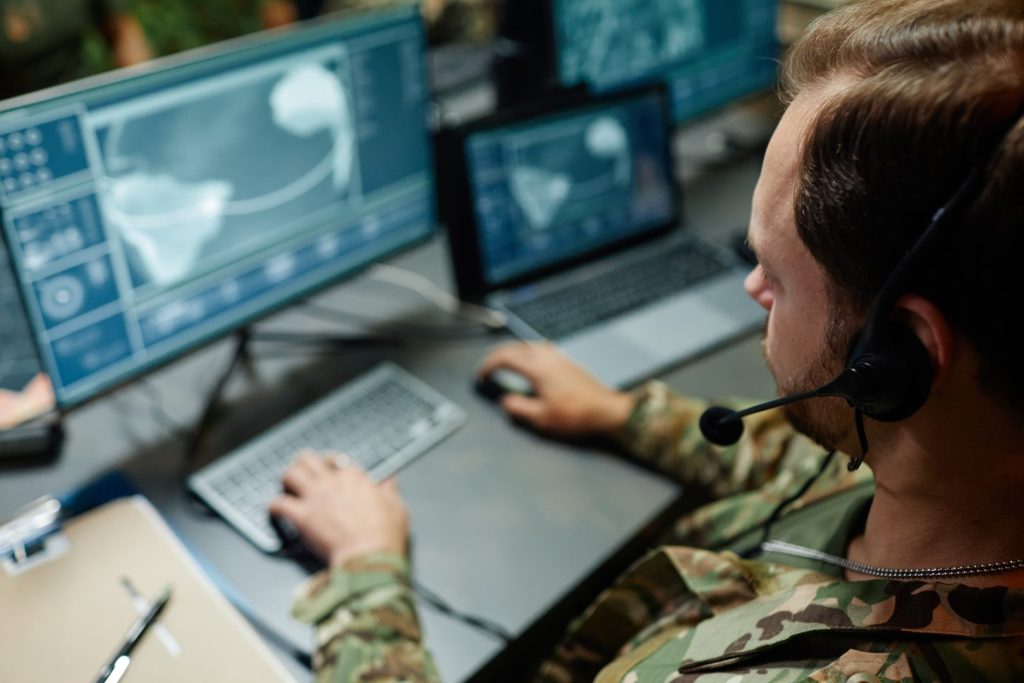 Military service member with headset
