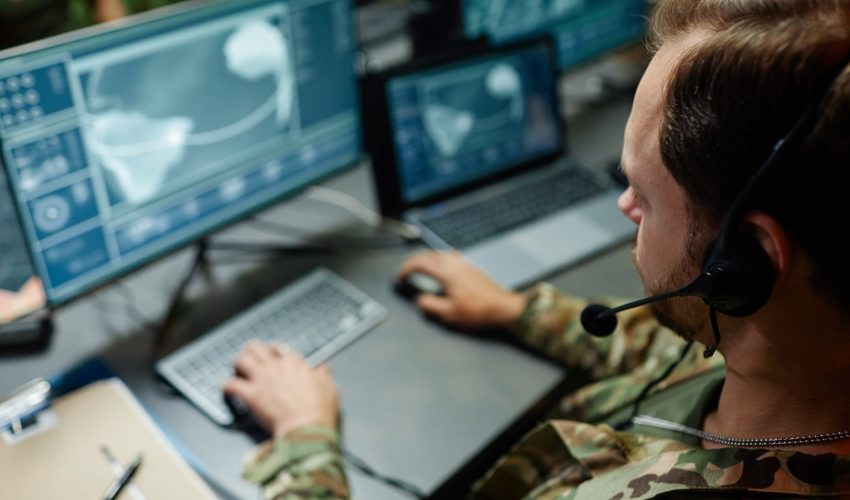 Military service member with headset